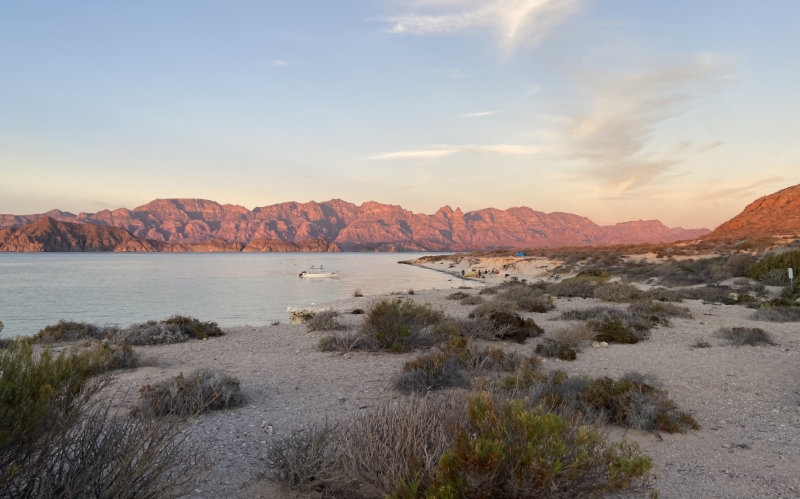View across a bay to desert mountains