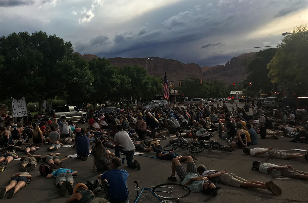 People lying in street in protest